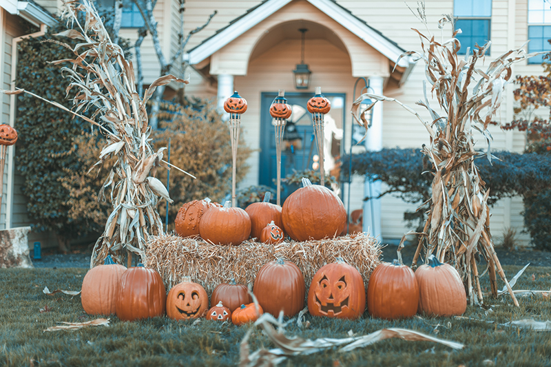 pumpkins in front of house